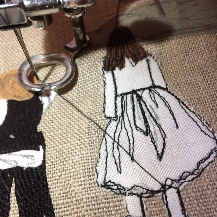 Stitched freehand embroidered fabric photo mounted