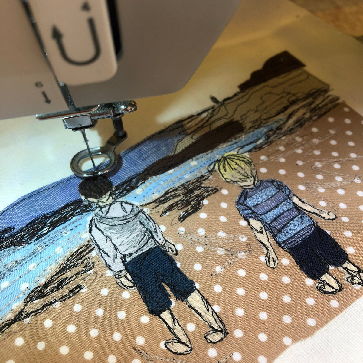 Stitched freehand embroidered fabric photo mounted