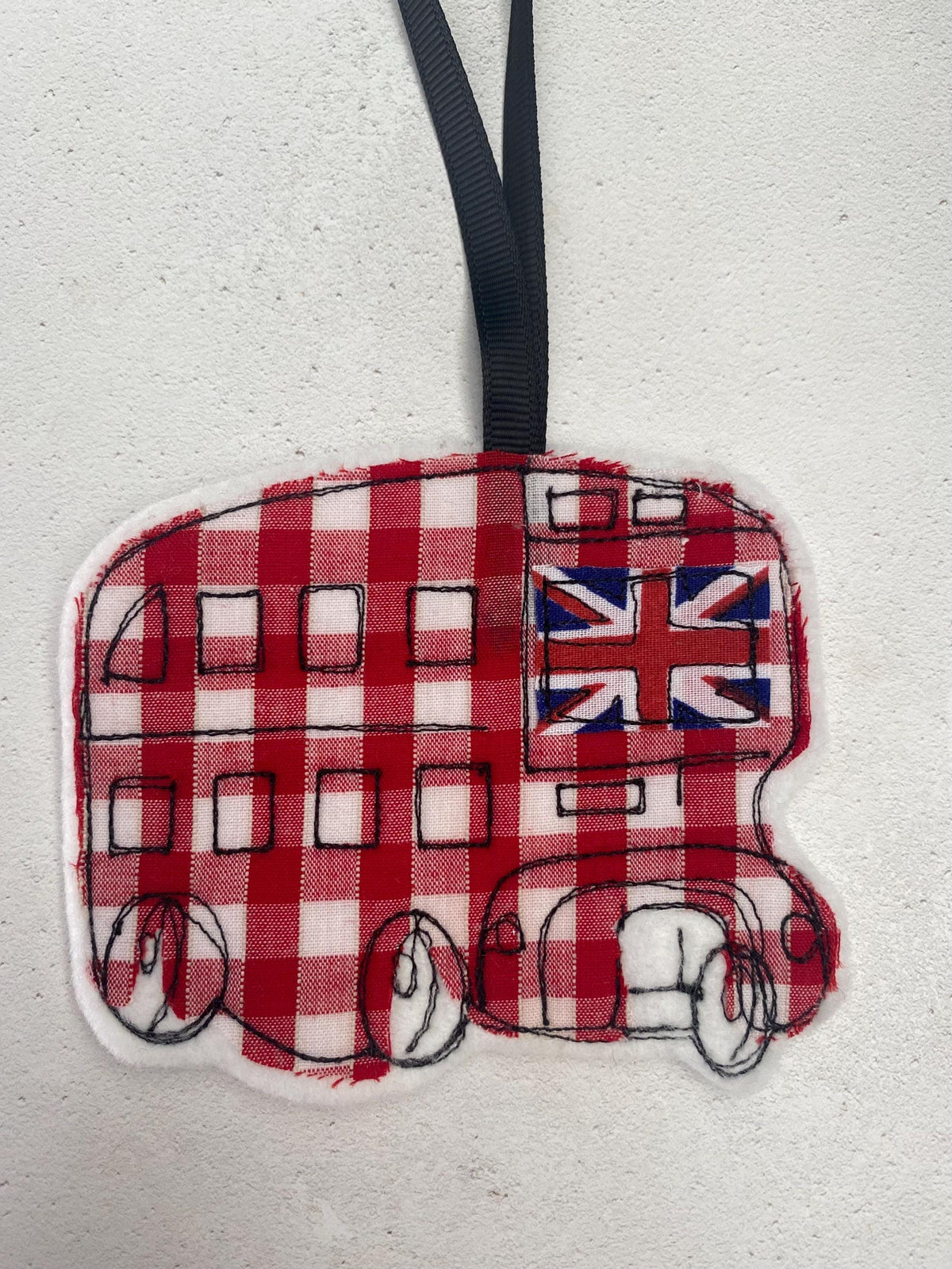Freehand embroidered London bus hanging decoration