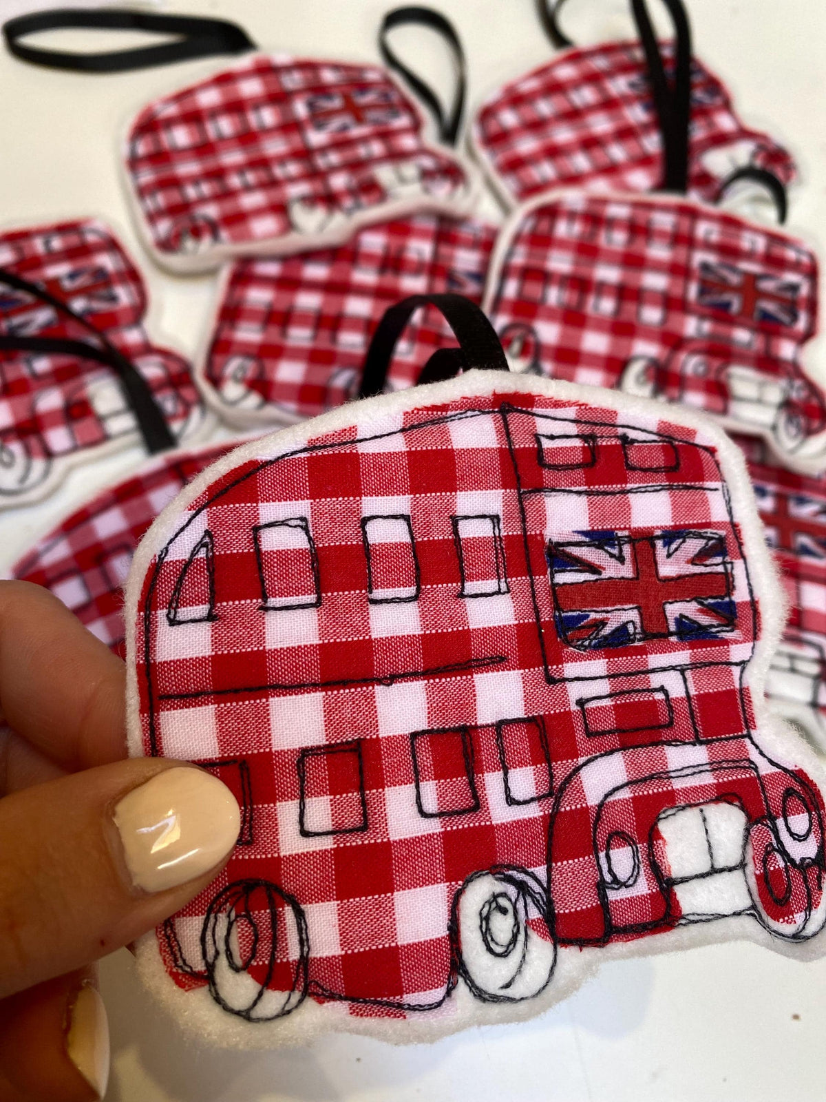 Freehand embroidered London bus hanging decoration